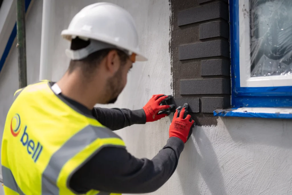 Bell Group asset management and exterior decorating team on site